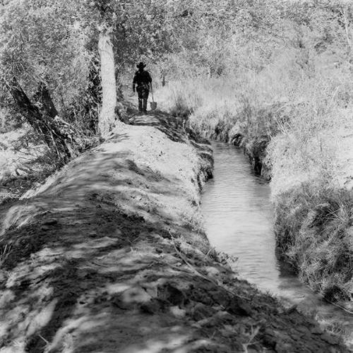 Walking the Ditch (from the series El Agua es la Vida: A Village Life Portrait)