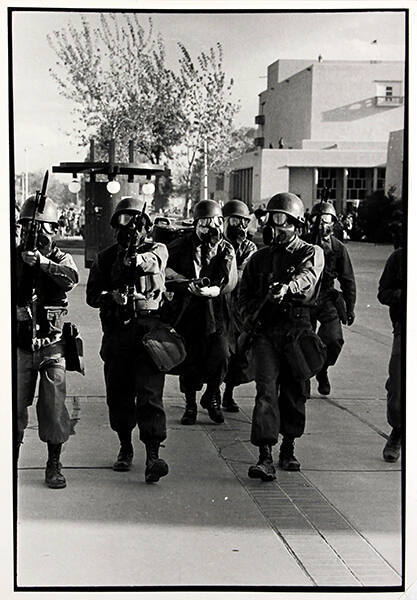 Untitled (New Mexico Army National Guards March Toward Strikers)