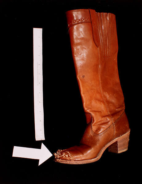 Exhibit G: Cowboy Boot, Assaulted (from the series Crime in the Home)