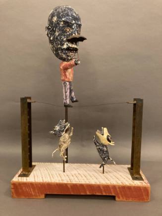 Ceramic and metal sculpture on wooden base by Wesley Anderegg, "Tightrope"