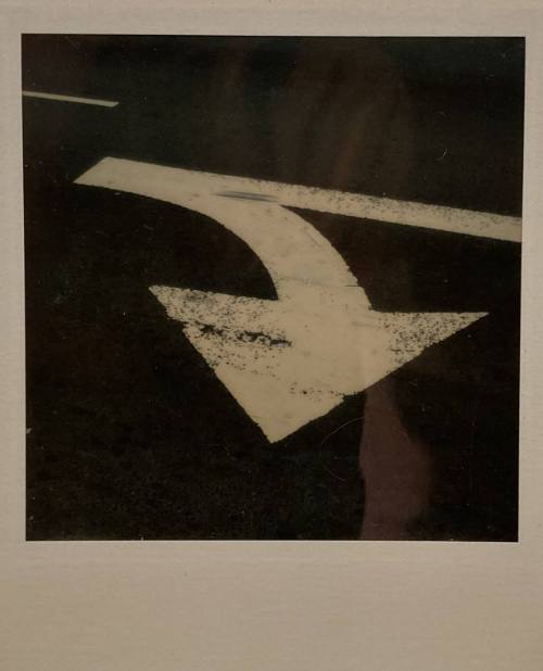 Untitled  (Arrow on asphalt)