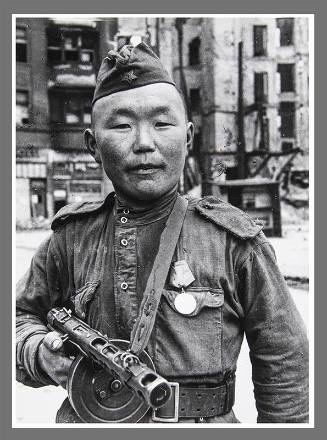 Asian soldier with machine gun