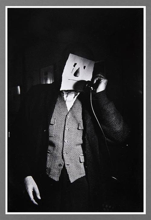 Sad Telephone Call (with Saul Steinberg mask)