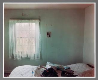 Bedroom in a house near Scranton, North Dakota, June 9, 2000