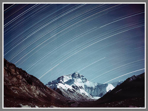 The North Face of Mount Everest, by Moonlight, with Star Tracks