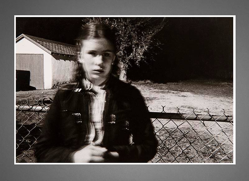 Untitled (Girl and fence)