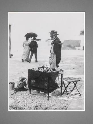 Untitled (Man - food vendor on beach)
