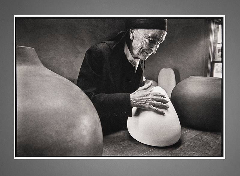 Georgia O'Keeffe at the Ghost Ranch with Pots by Juan Hamilton