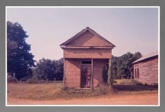 Chromogenic print by William Christenberry, "Building with False Brick Siding, Warsaw, Alabama,…