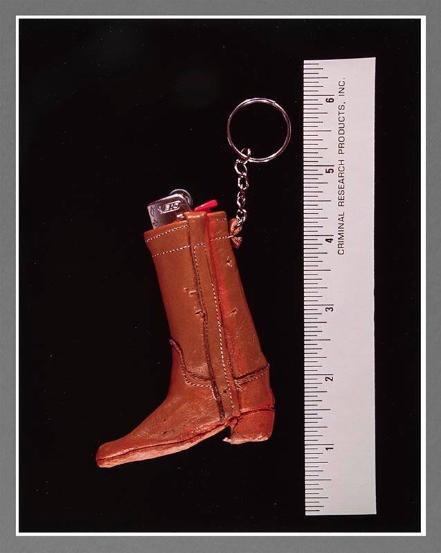 Exhibit H: Cowboy Boot, Lighter, Assaulted (from the series Crime in the Home)