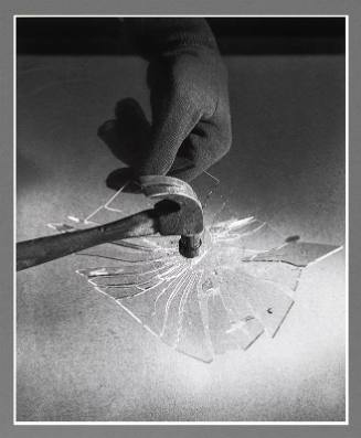 Hammer Breaking Glass