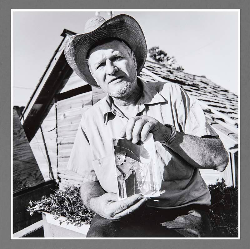 Darius Walter with Photograph of Himself, Lamona Colony, Washington