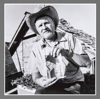 Darius Walter with Photograph of Himself, Lamona Colony, Washington
