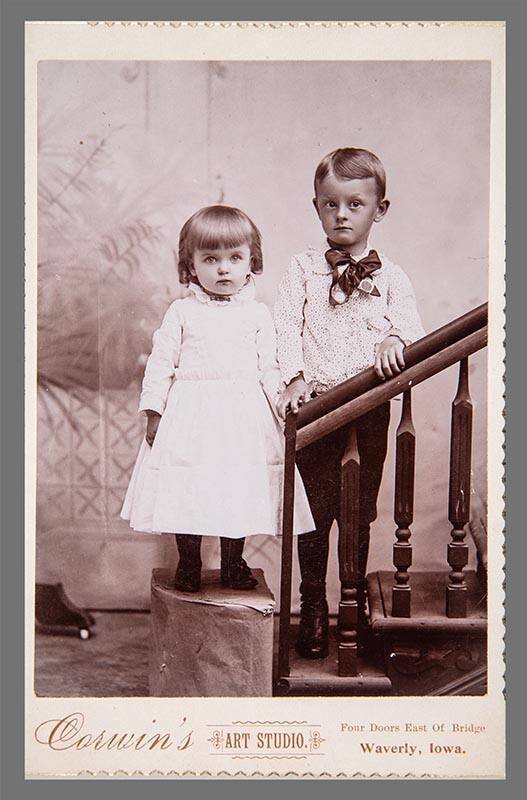 Untitled (Two children on stairwell)