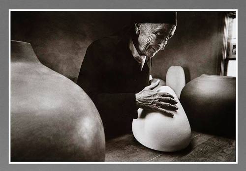 Georgia O'Keeffe at the Ghost Ranch with Pots by Juan Hamilton