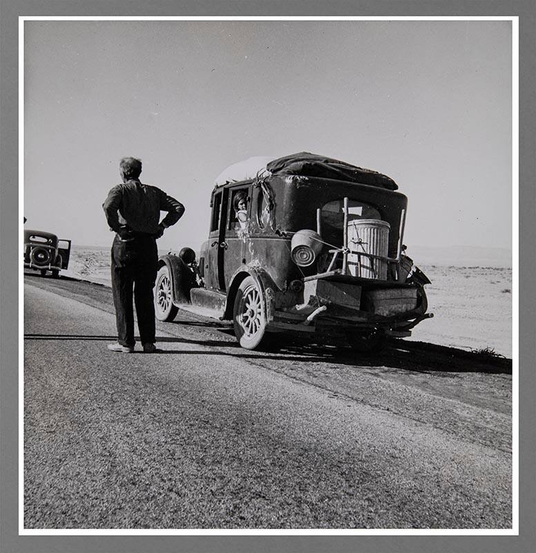 Southern California desert. Migrant from Chickasaw, Oklahoma, stalled on the desert in southern California with no money. He and his ten children are facing future in California