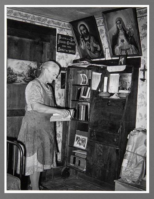 Pie Town, New Mexico. Mrs. George Hutton In Front of Bookcase