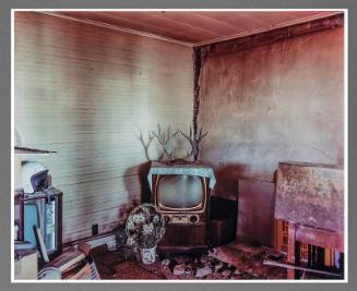 Living room in a house near Ludlow, eastern Colorado, July 6, 1999