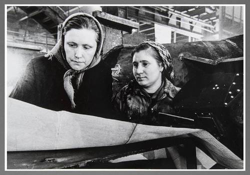 Two Women With Blue Prints
