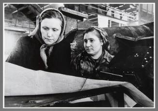 Two Women With Blue Prints