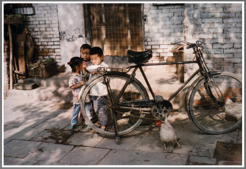 Children and Bicycle, China
