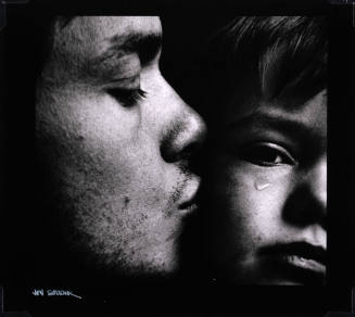 Man Kissing Away a Tear