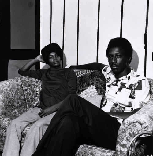 Untitled (Couple on loveseat)