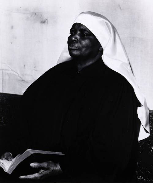 Untitled (Seated woman with book)