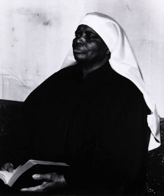 Untitled (Seated woman with book)