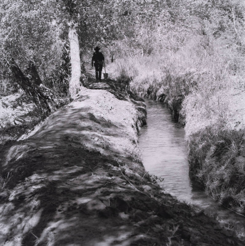 Walking the Ditch (from the series El Agua es la Vida: A Village Life Portrait)