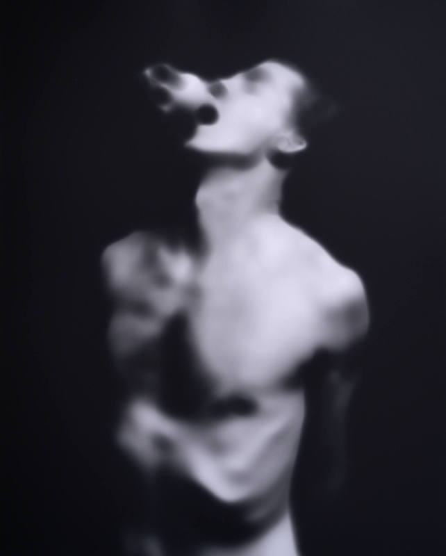 Man with Object in Mouth