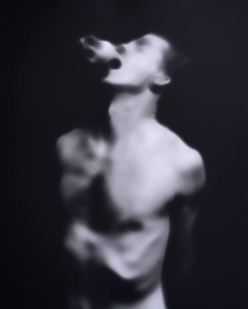Man with Object in Mouth