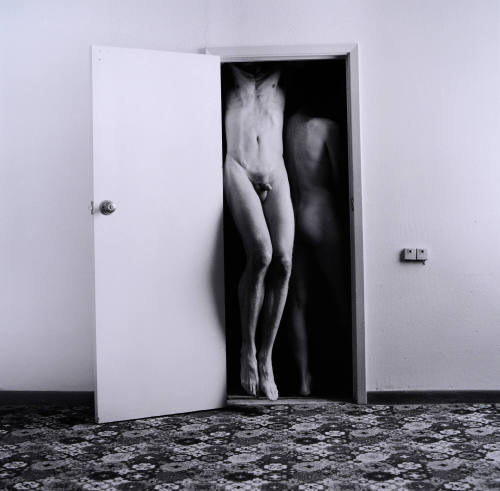 Man and Woman in Doorway