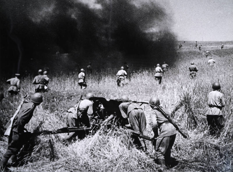 Soldiers advancing in a field
