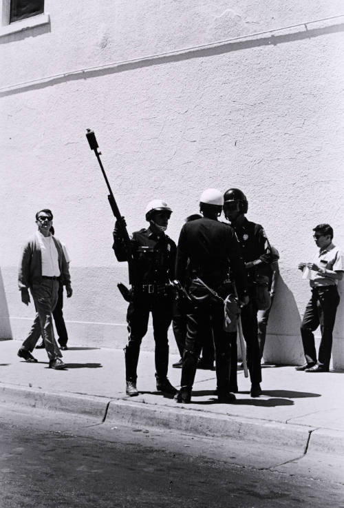 Untitled (Police Officers and Bystanders on Sidewalk)
