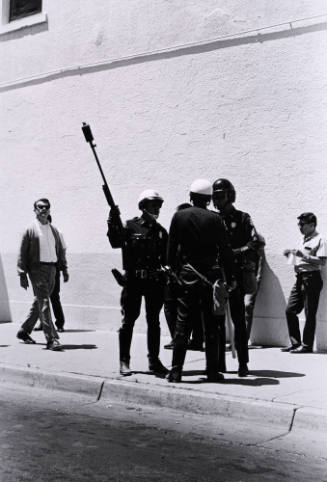 Untitled (Police Officers and Bystanders on Sidewalk)