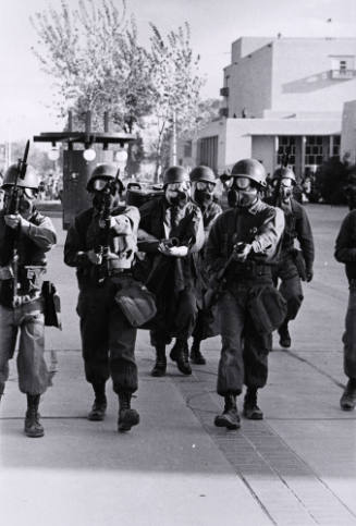 Untitled (New Mexico Army National Guards March Toward Strikers)