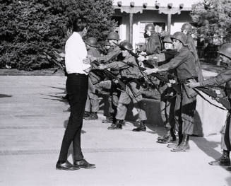 Untitled (Man Approaching New Mexico Army National Guards)