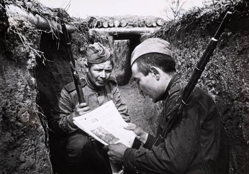 Reading an Uzbeck newspaper
