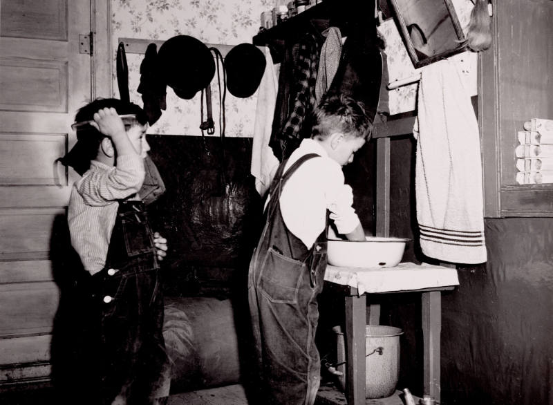 Two of Juan Lopez Sons Washing Up