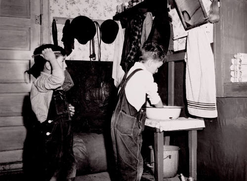 Two of Juan Lopez Sons Washing Up