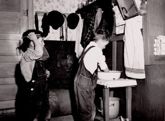 Two of Juan Lopez Sons Washing Up