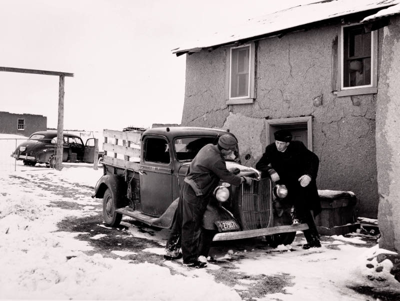Father Cassidy Helps Fix a Car