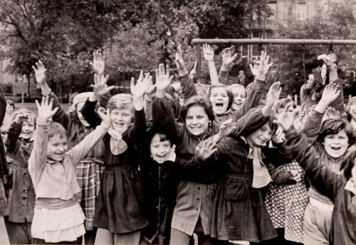 Hungary (Children with arms raised)