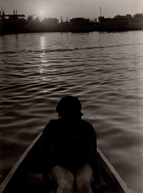 #460 (woman in boat)