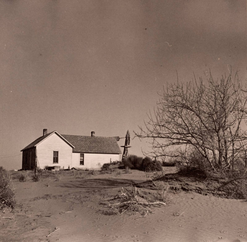 Shifting Drifts of Dust Will Soon Force this Farmer to Abandon His Home Near Liberal, Kansas