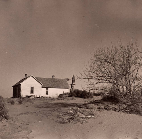 Shifting Drifts of Dust Will Soon Force this Farmer to Abandon His Home Near Liberal, Kansas