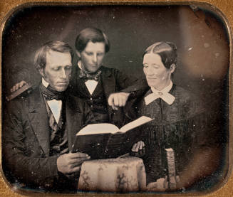 Untitled (Mother, Father and Son Reading)