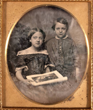 Untitled (Boy and girl with open book)