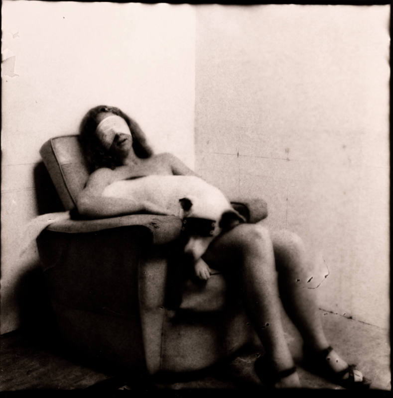 Anonyme Atrocities (Seated woman with white dog)/Anonymous Atrocities